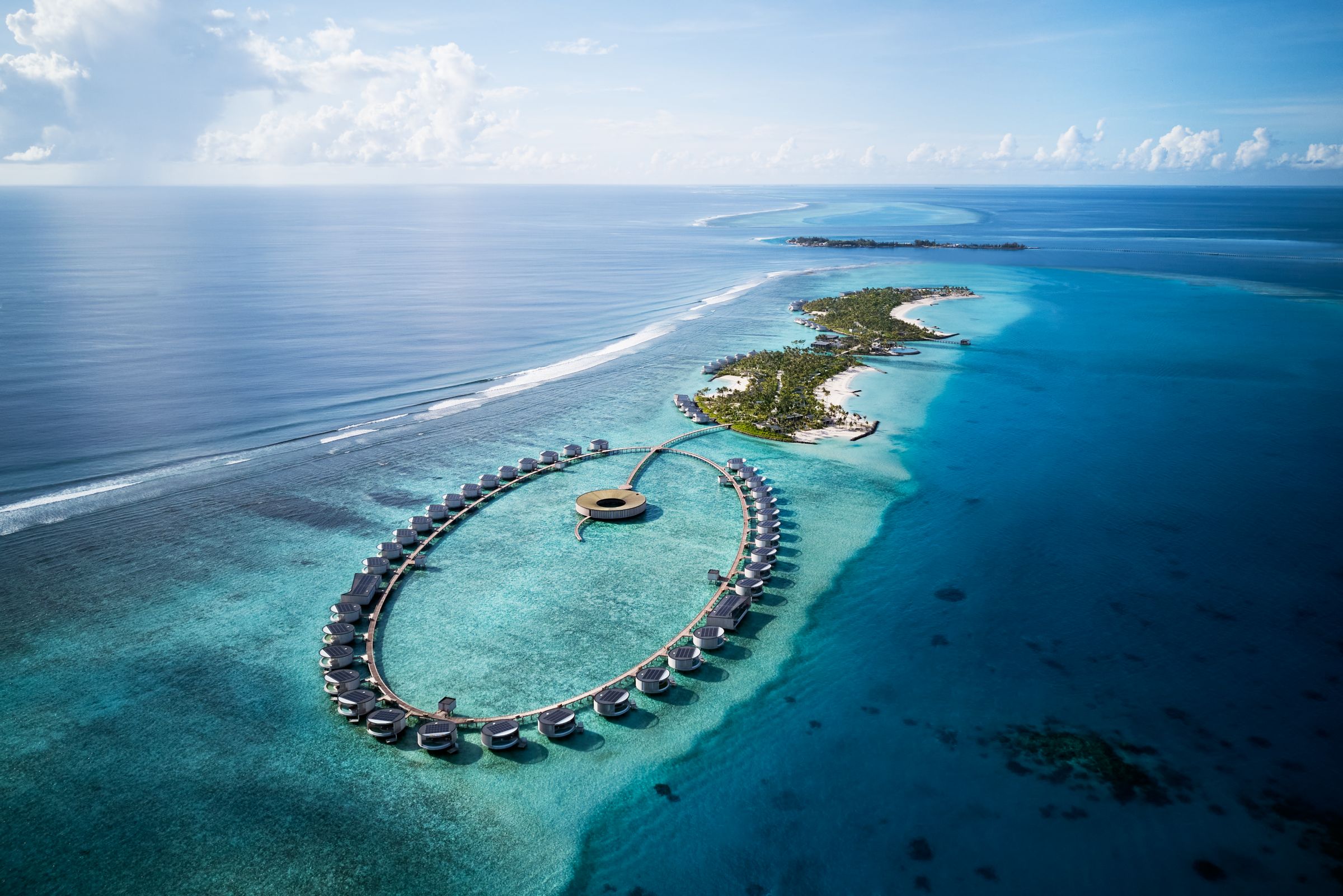 Aerial view of the resort islands with the ring of overwater villas, The Ritz-Carlton Maldives, Fari Islands