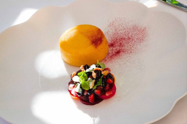 A plated dish from The Reading Room on a scalloped white plate, The Roseate Reading