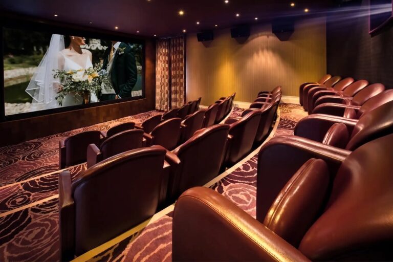 Upstage Mini, the private cinema, with leather armchairs facing the screen, The Roseate Reading