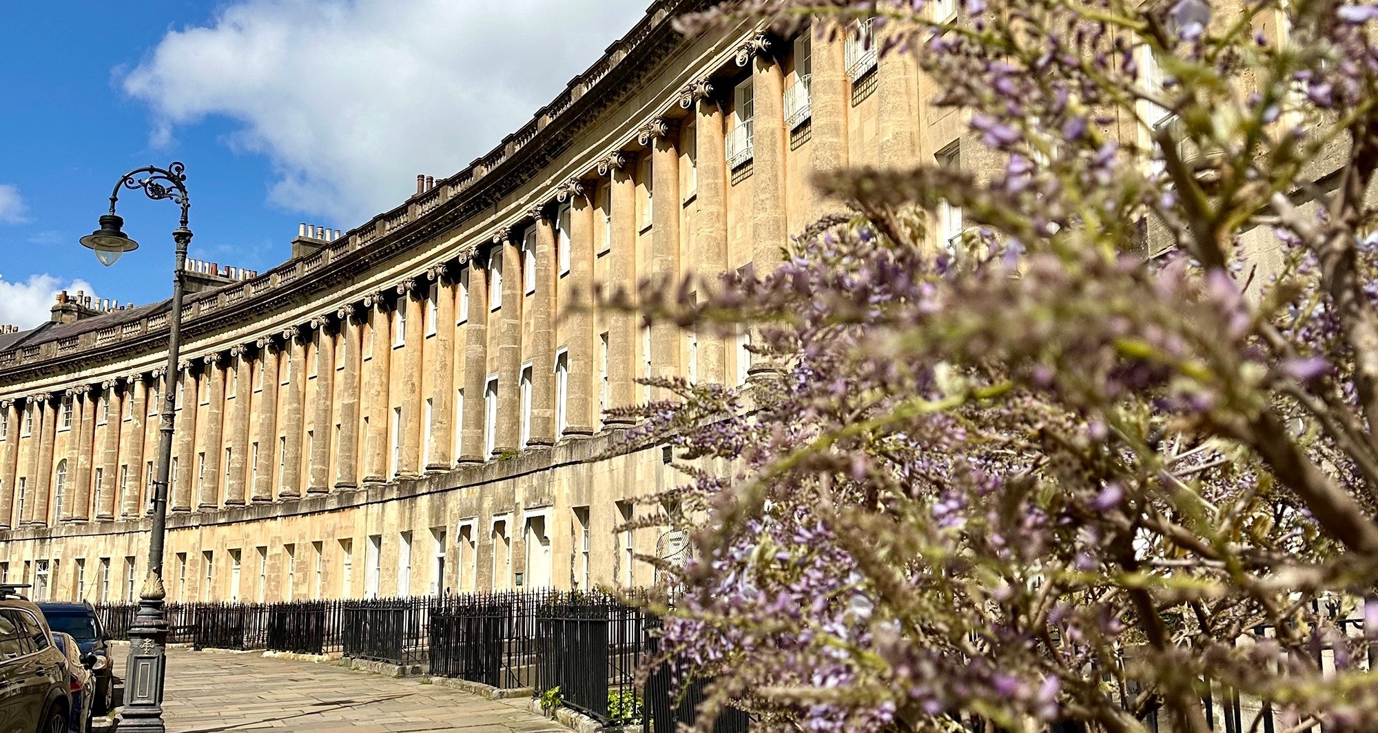 The curve of the Royal Crescent with wisteria in bloom, The Royal Crescent Hotel & Spa