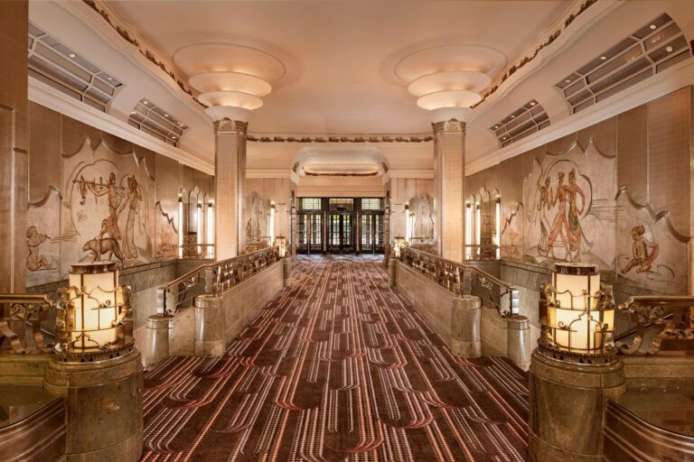The Silver Gallery leading to the Ballroom, with painted murals, silvered columns and glowing lamps, The Sheraton Park Lane Hotel