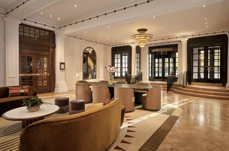 The Piccadilly lobby with a marble floor, velvet sofas and an Art Deco chandelier, The Sheraton Park Lane Hotel