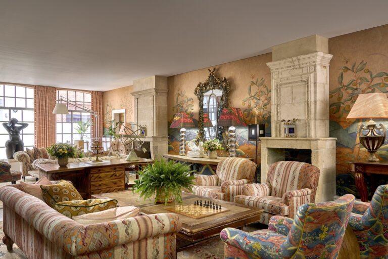 The Drawing Room, with its fireplace and long sofas, The Soho Hotel