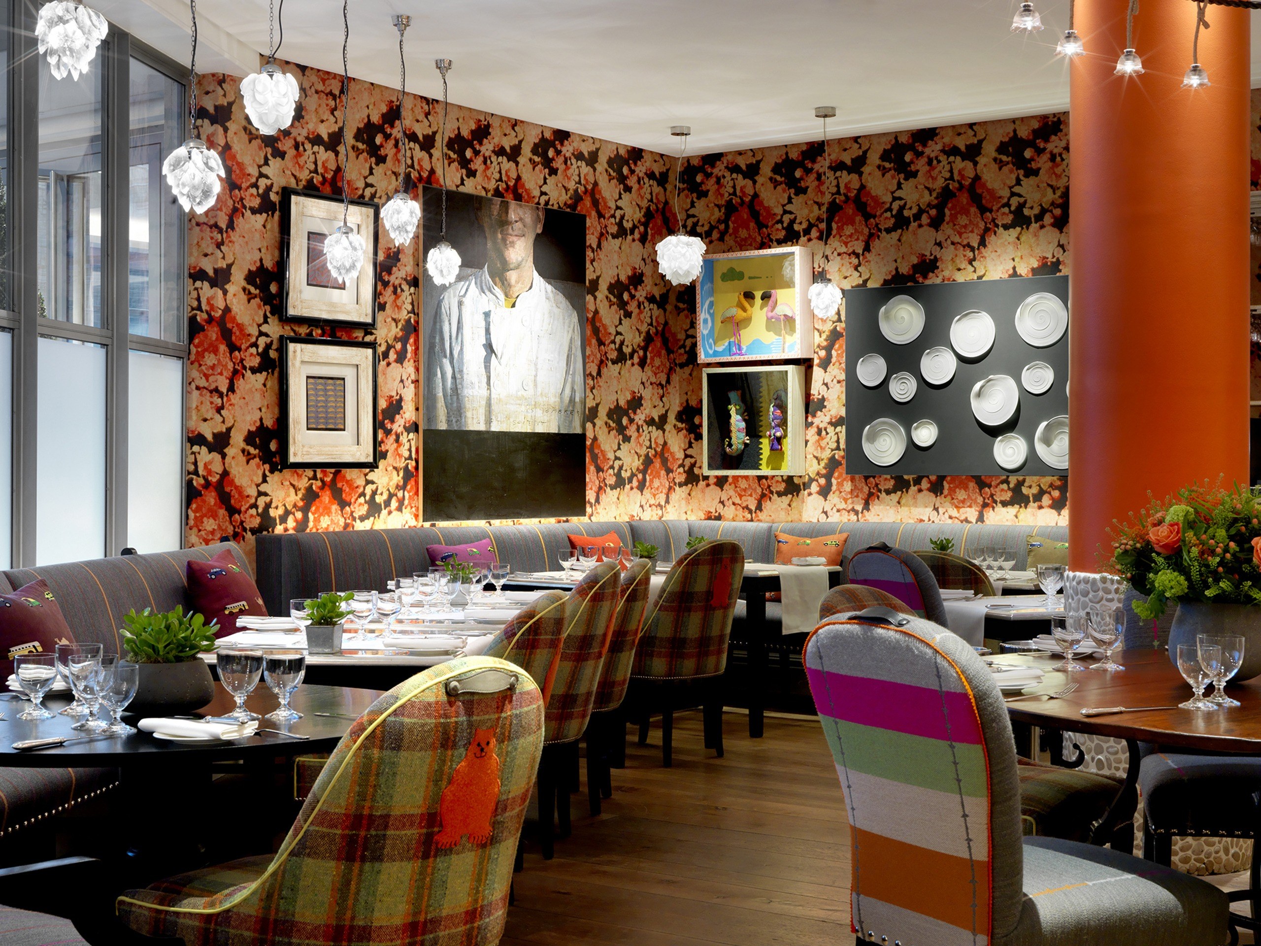 Dining at Refuel, beneath a patterned feature wall, The Soho Hotel