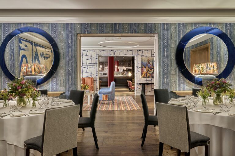 The Indigo Room, with its round mirrors, The Soho Hotel