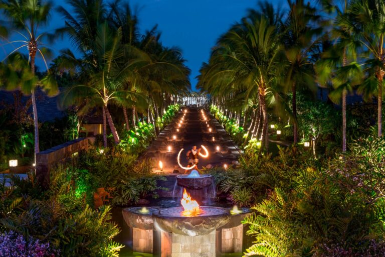 Fire dancer beside the Black Sand Pond, The St. Regis Bali Resort