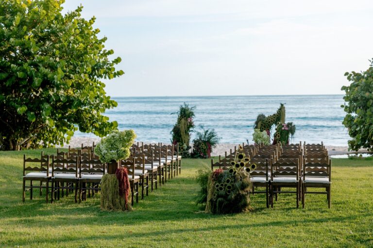 Rows of chairs set out for a lawn ceremony beside the sea, The St. Regis Punta Mita Resort