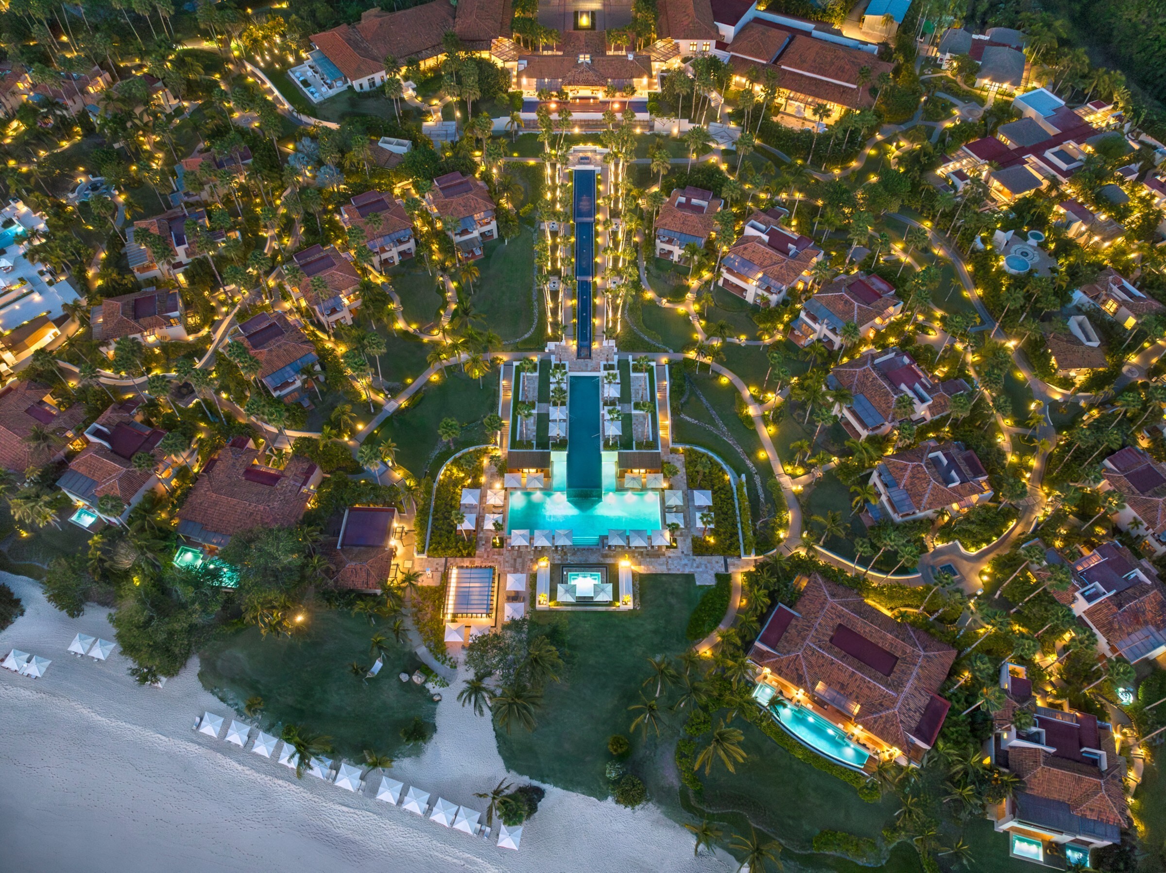 Aerial view of the resort grounds lit at night, The St. Regis Punta Mita Resort