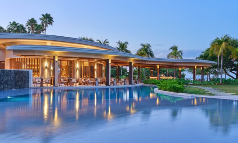 A restaurant beside the pool at dusk, The St. Regis Punta Mita Resort