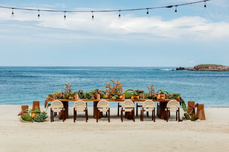 A long banquet table on the beach, The St. Regis Punta Mita Resort