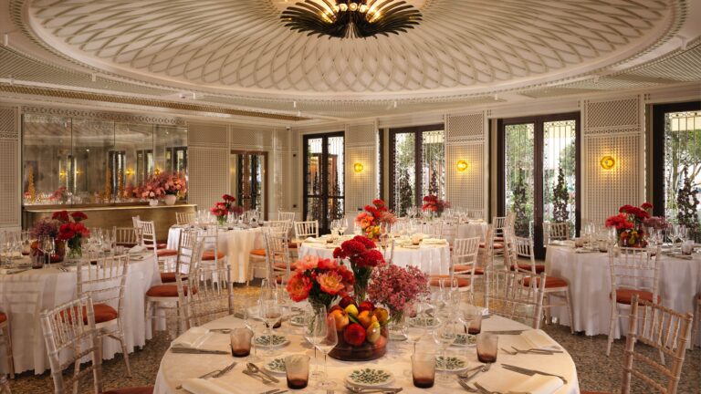 Round tables with flowers in the Canaletto Ballroom, The St. Regis Venice