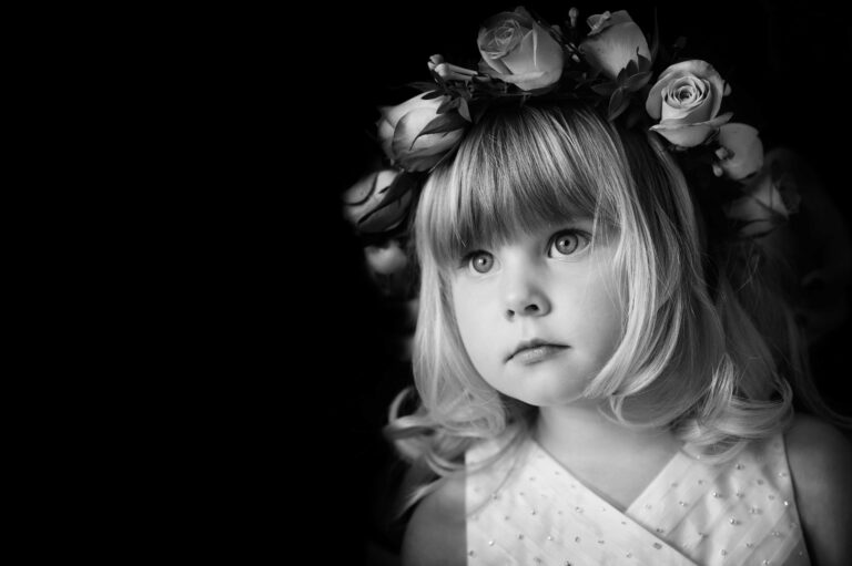 A flower girl, roses in her hair, unposed, The Studio Without Walls