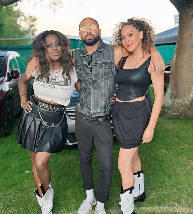 Three performers together on a lawn, The Sway Allstars