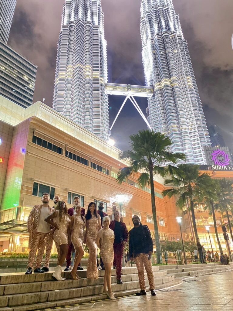 The band on steps in front of the Petronas Towers in Kuala Lumpur, The Sway Allstars