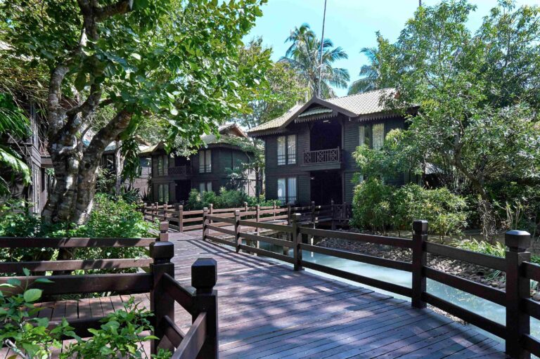 Garden Suite and boardwalk among the resort gardens, The Taaras Beach and Spa Resort