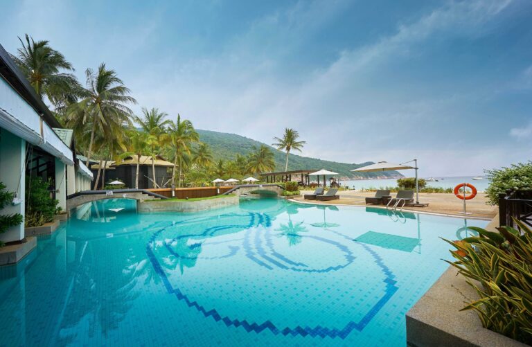Resort swimming pool facing the bay, The Taaras Beach and Spa Resort