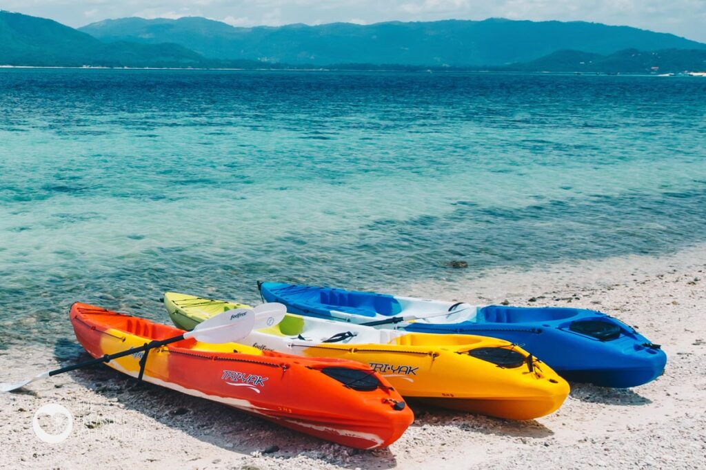 Kayaks on the beach, with the Samui coast across the water