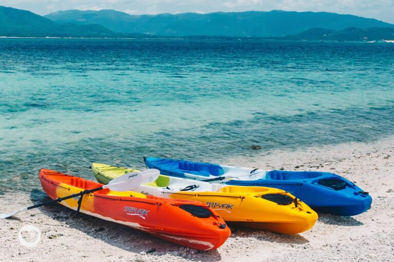 Kayaks on the beach, with the Samui coast across the water, The Treasure Resort Koh Madsum - Samui