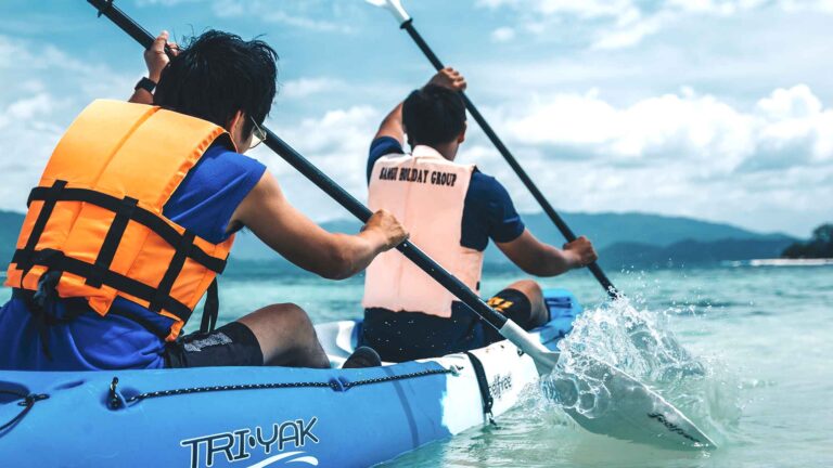 Two guests paddling a kayak off the island, The Treasure Resort Koh Madsum - Samui
