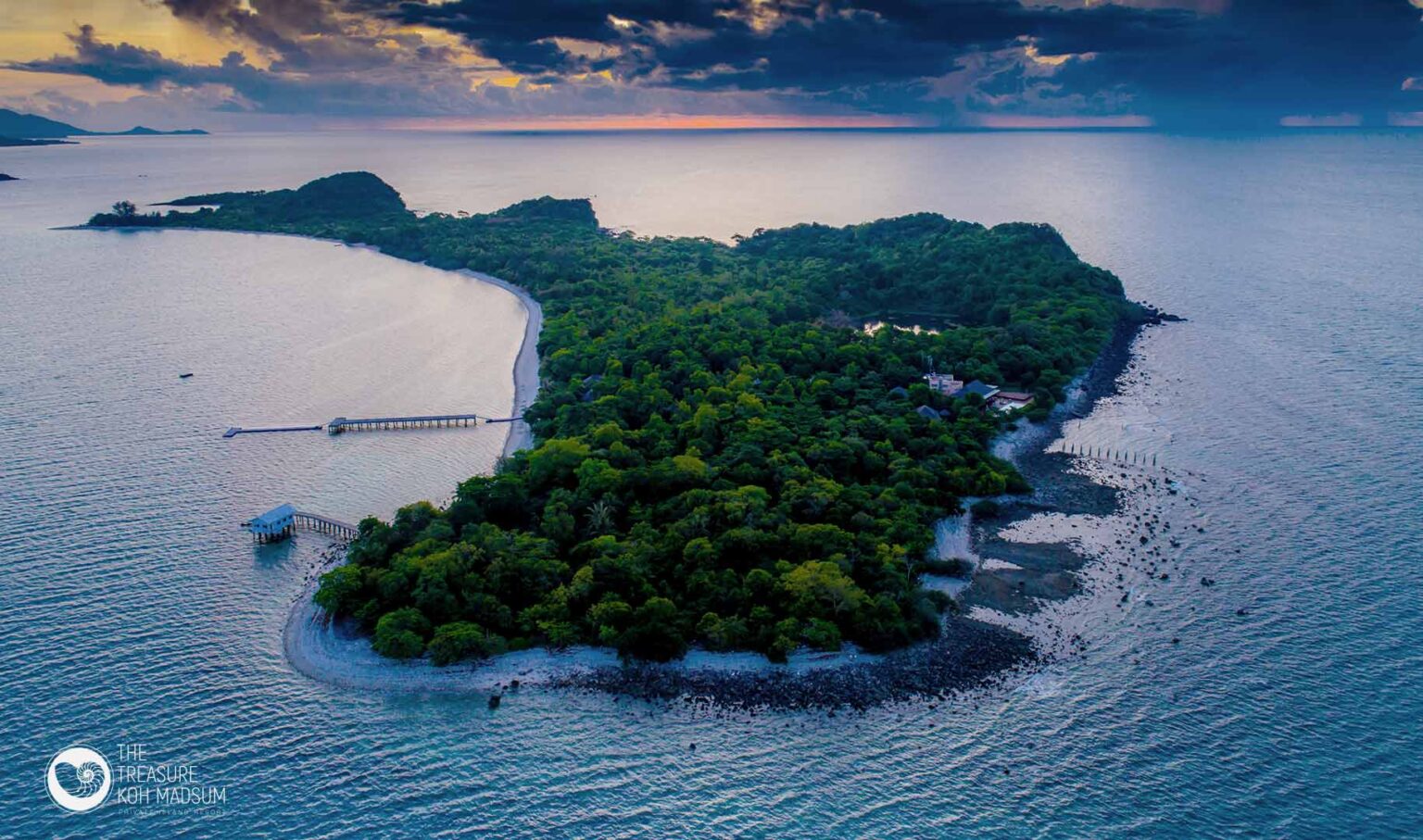 Koh Madsum at dusk from the air, with the jetty at the water’s edge