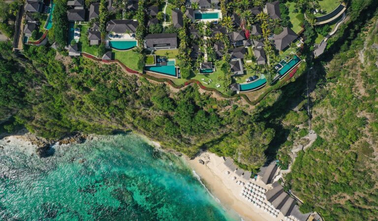 Aerial view of the resort and the Sundays Beach Club cove, The Ungasan Clifftop Resort