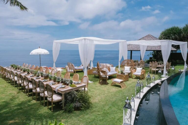 Long tables under canopies beside the pool, The Ungasan Clifftop Resort