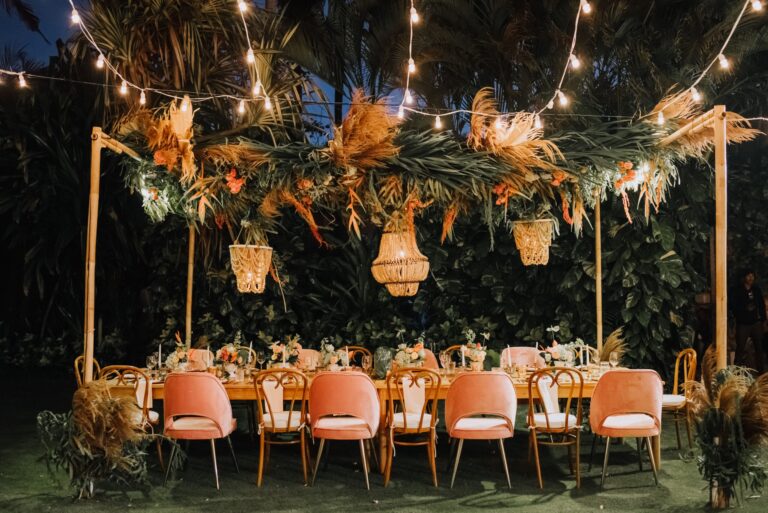 Reception table under a hanging floral installation, The Ungasan Clifftop Resort