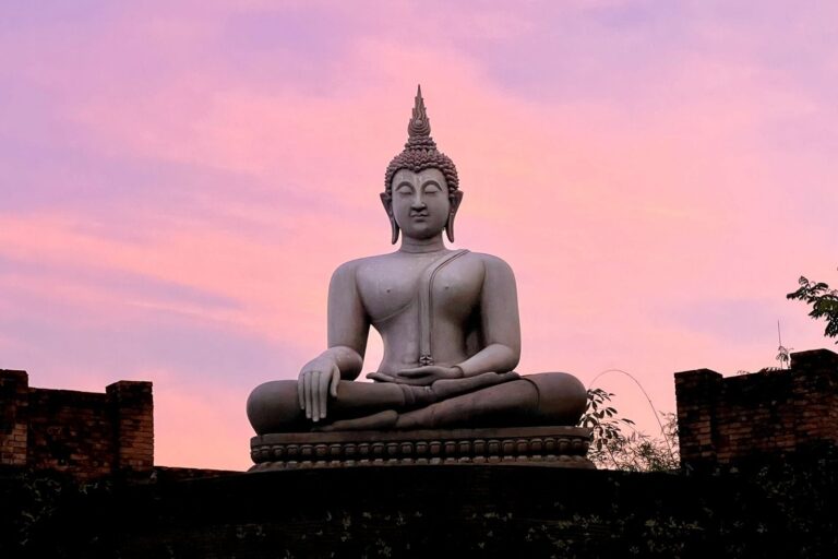 The seated Buddha sculpture in the Buddha Garden at dusk, The Vanderbilt Estate