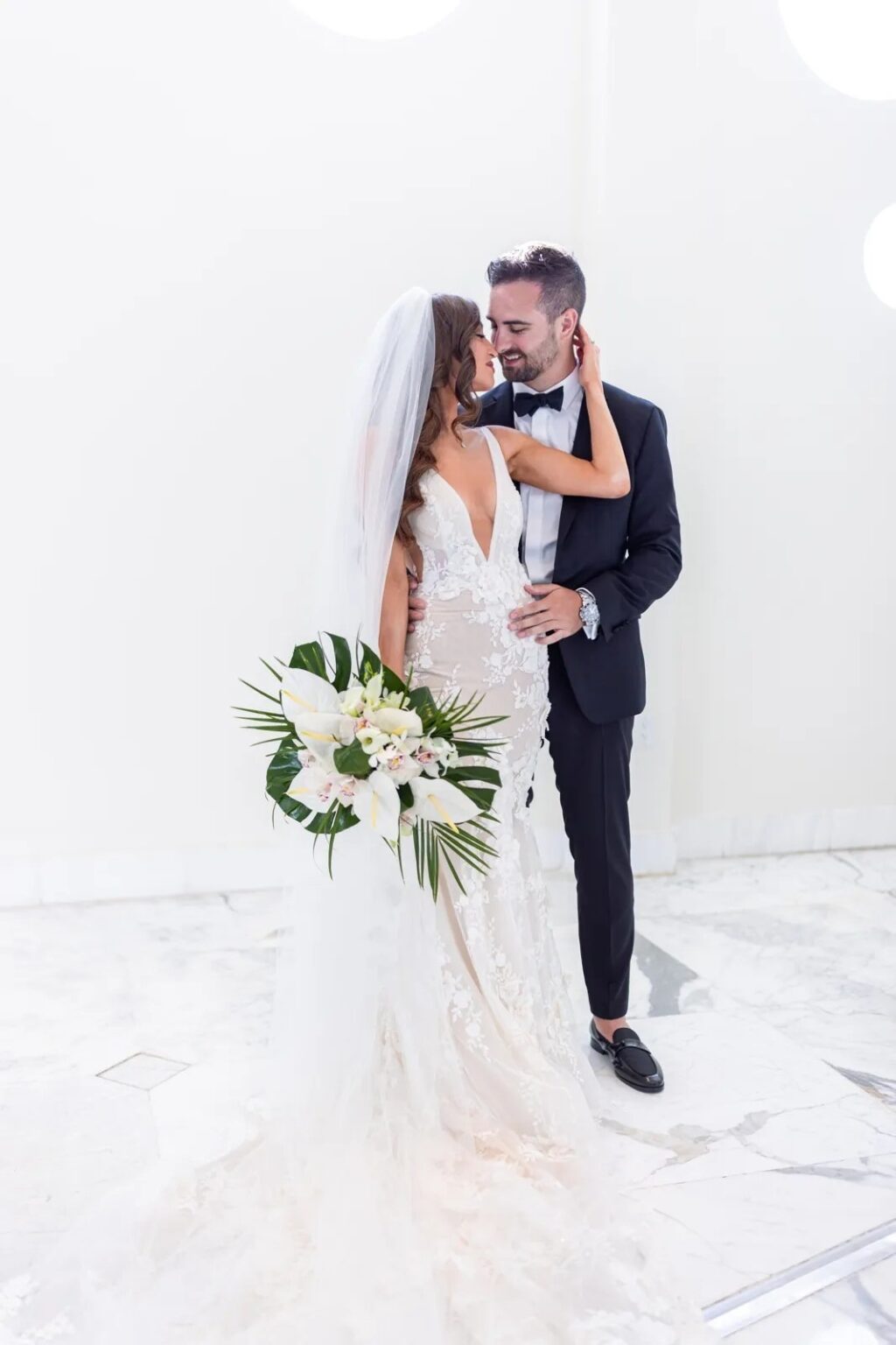 A bride and groom embracing, The Wedding Atelier