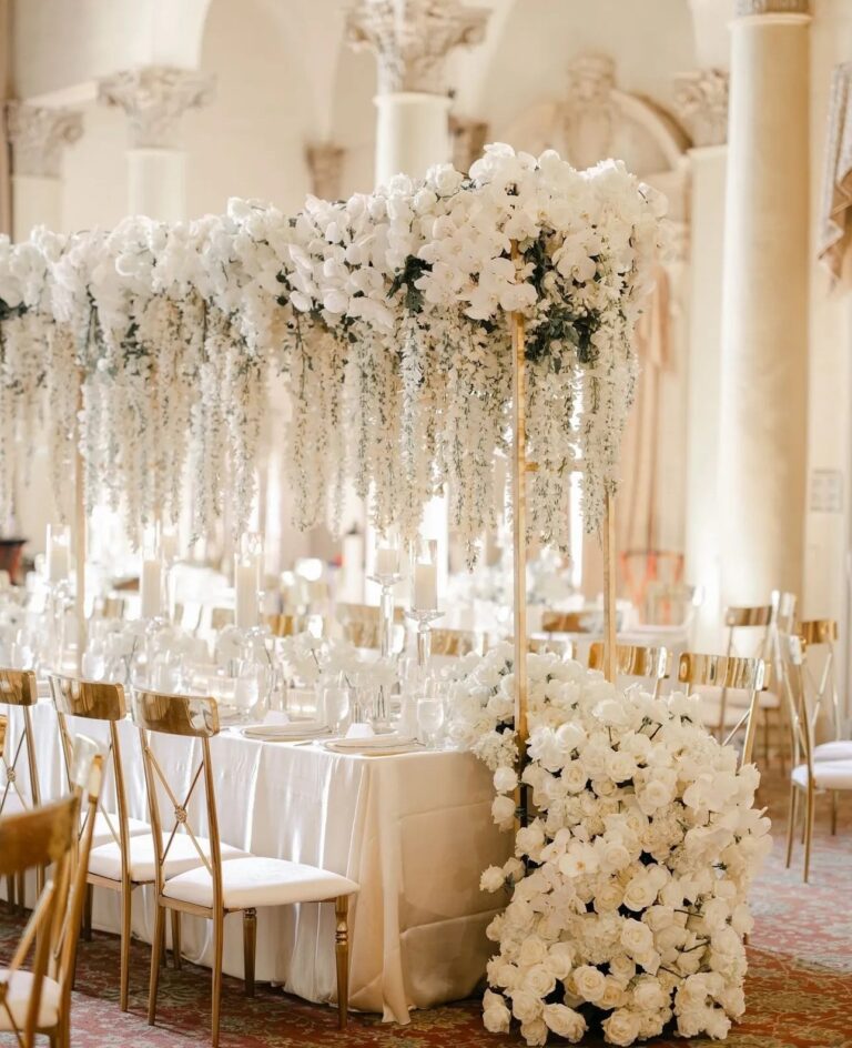 A tall white floral tablescape, The Wedding Atelier