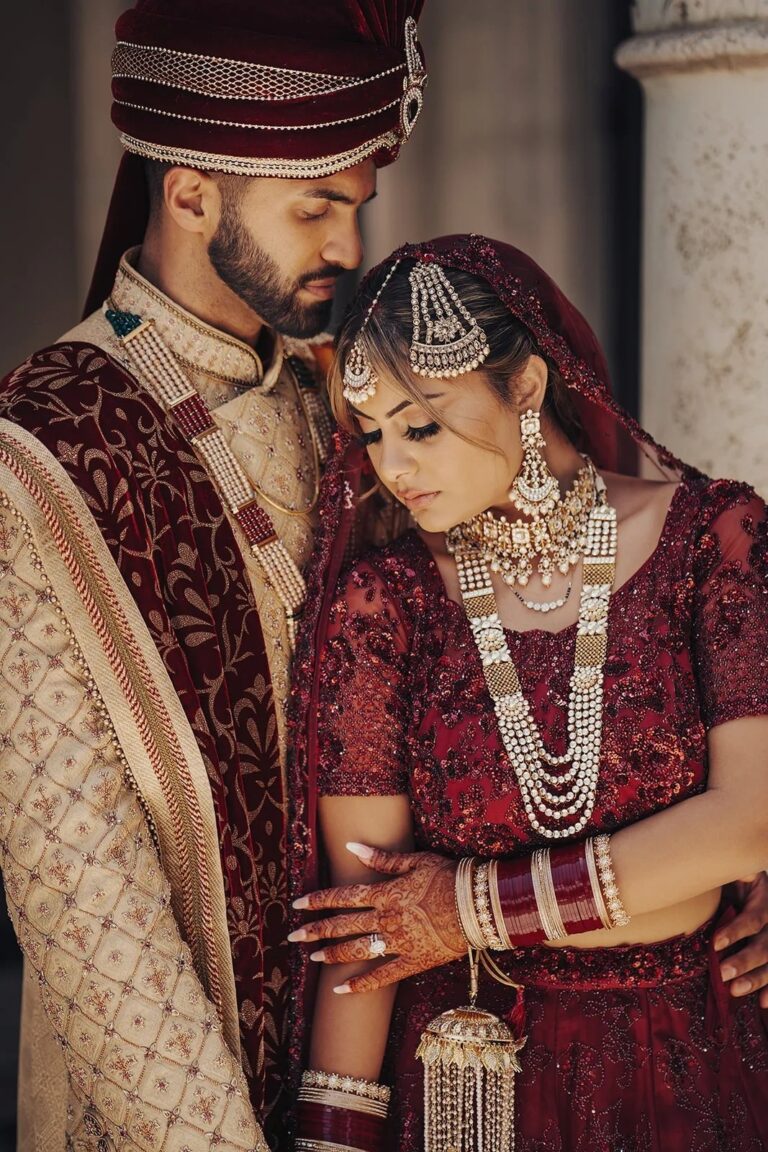 A couple in traditional red wedding dress, The Wedding Atelier
