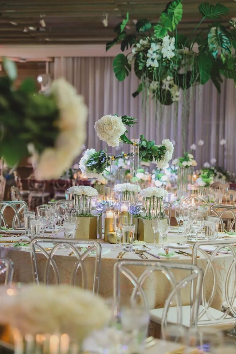 A reception table with greenery and flowers, The Wedding Atelier