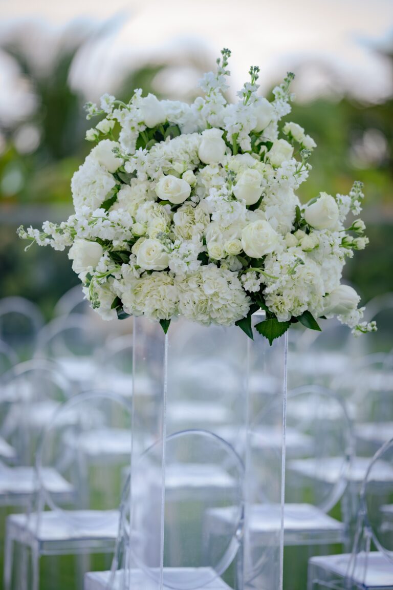 White roses and chairs at a ceremony, The Wedding Atelier