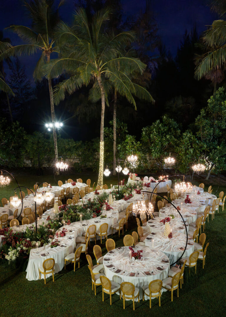Serpentine dinner tables glowing among palms at night, The Wedding Bliss - Thailand