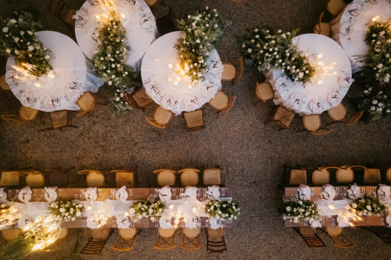 Aerial view of round tables with flower runners and candles, The Wedding Bliss - Thailand