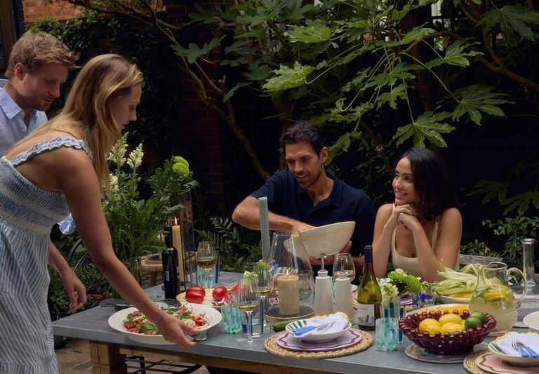 Newlyweds having a barbecue together, The Wedding Shop