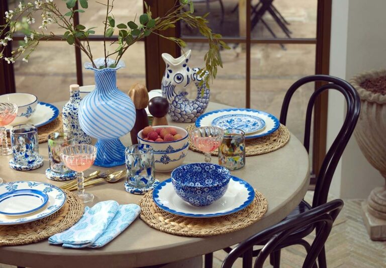 A table set with blue and white tableware, The Wedding Shop