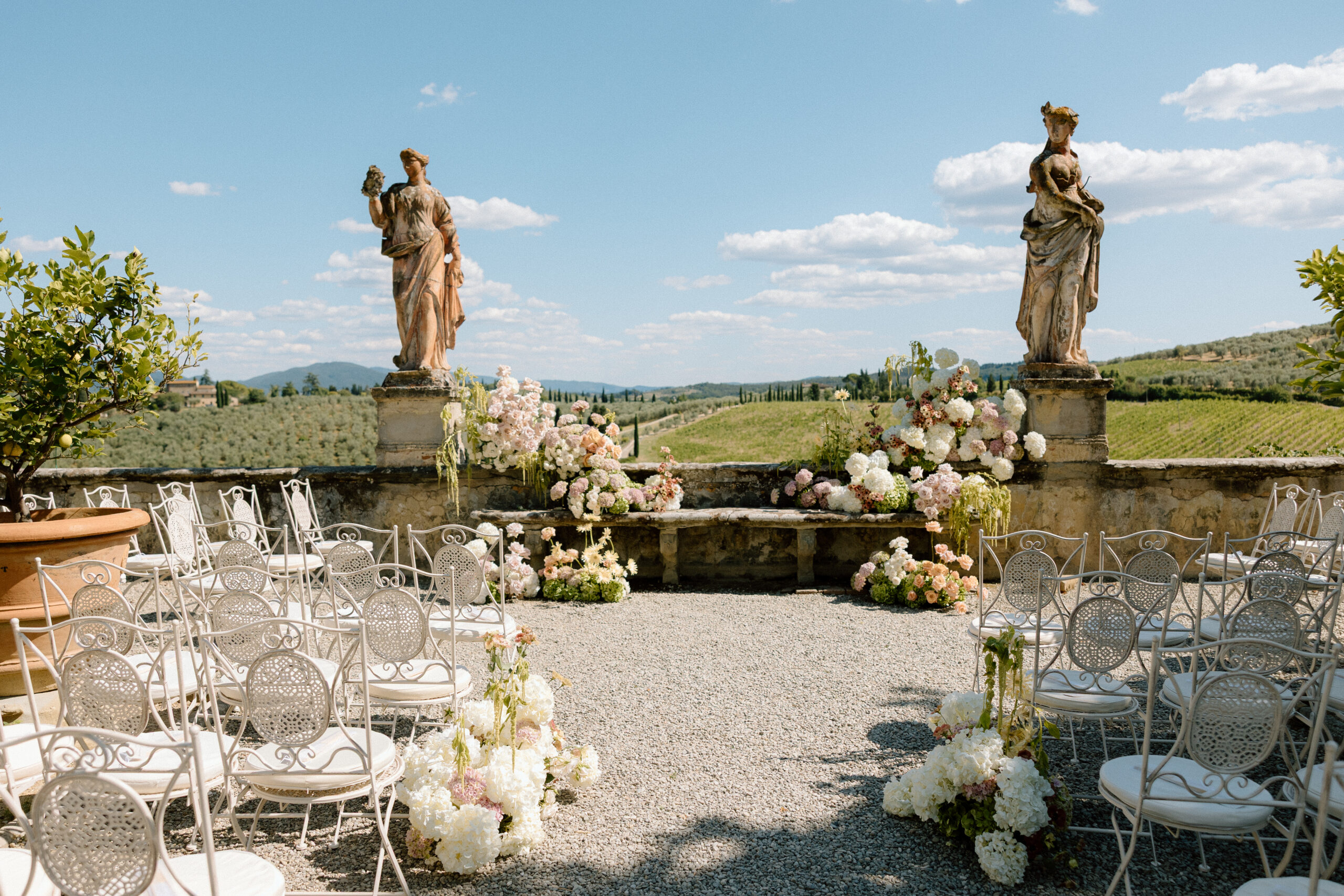 Ceremony set-up on the statue terrace at Villa Corsini a Mezzomonte, outside Florence, for Gabrielle and Sean, TheKnotInItaly