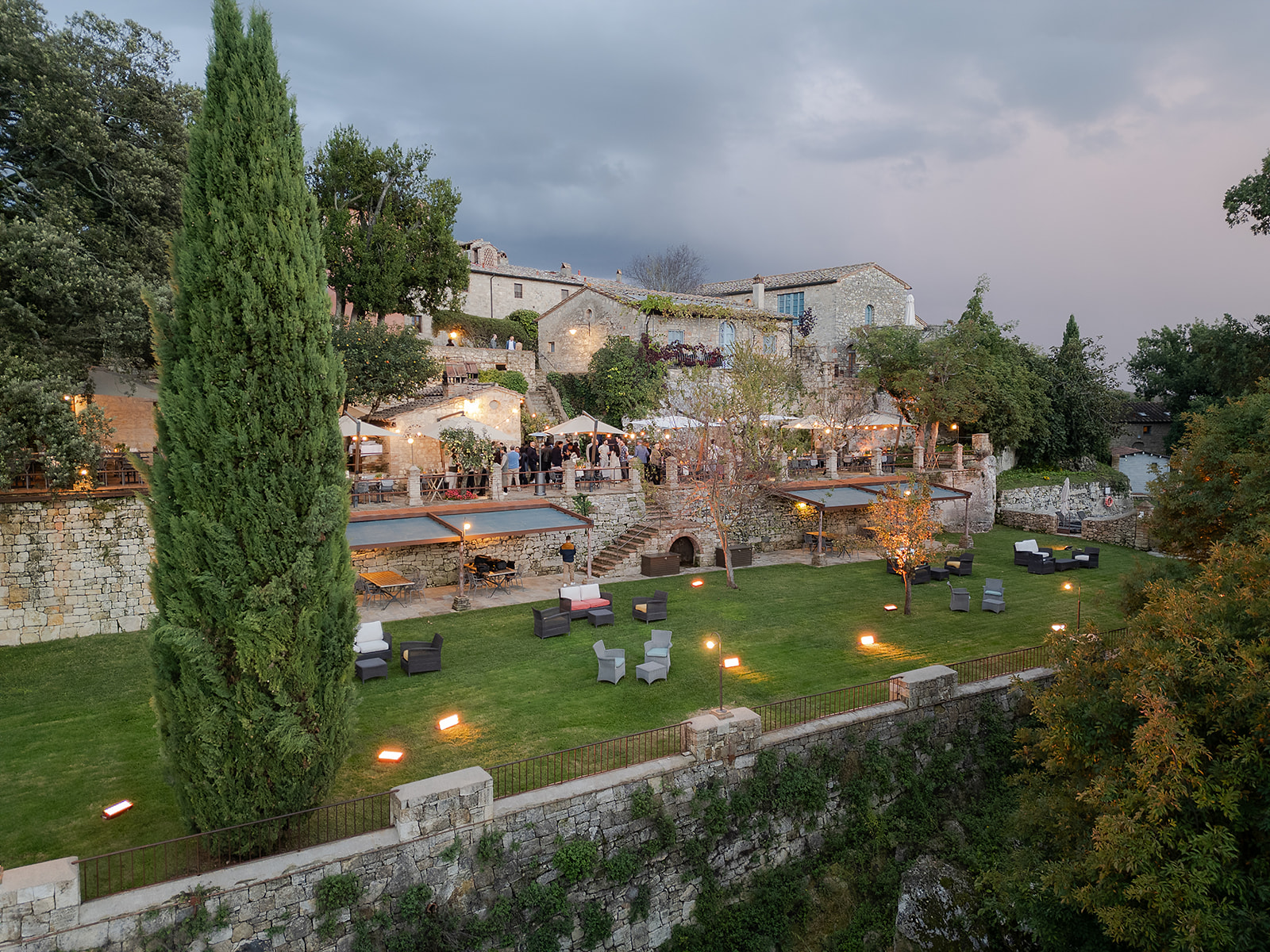 The lawn laid out for the evening at Borgo Pignano, Tuscany, for Anusha and Joel, TheKnotInItaly