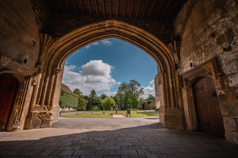 Looking out through the stone arch of the gateway to the lawns, Thornbury Castle