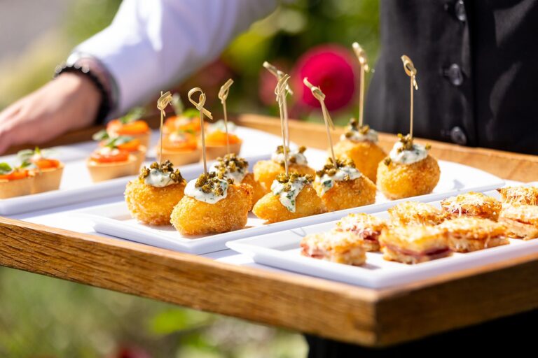 Canapés served on wooden boards, Thornbury Castle