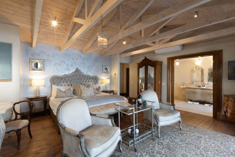 The Sicily Island Suite, bed and dressing table, ensuite beyond, Tintswalo Atlantic