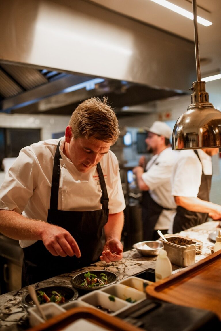 Chefs Warehouse, the chef plating a dish at the pass, Tintswalo Atlantic