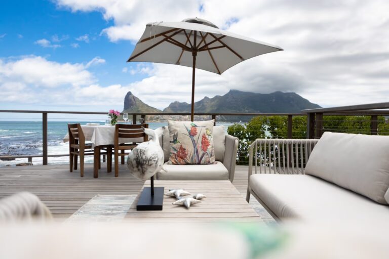 Deck lounge with views of the Sentinel, Tintswalo Lodges