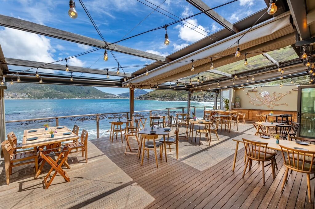 The dining terrace under a glass roof