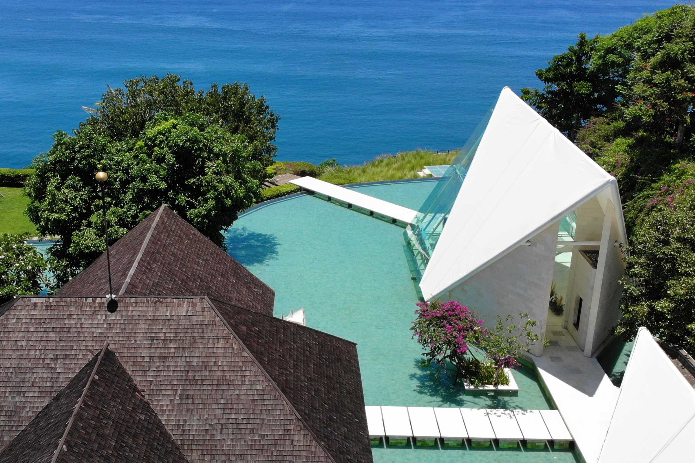 The Glass Chapel on the cliff edge, seen from above, Tirtha Bridal
