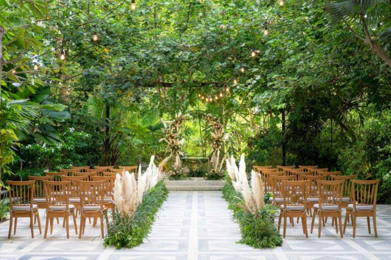 The ceremony aisle in the Moonlight Garden at Glass House, Tirtha Bridal
