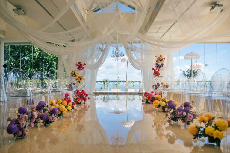 The Heaven Room on the upper floor, dressed with flowers and white drapes, Tirtha Bridal
