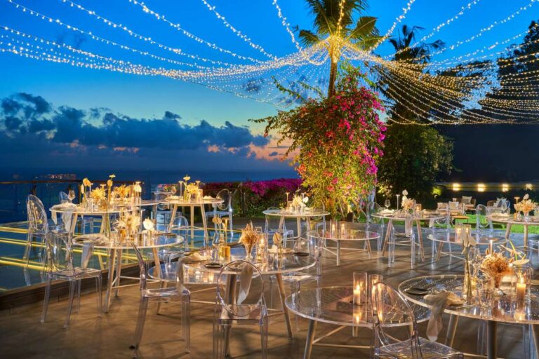 Reception tables under fairy lights at dusk, Tirtha Bridal