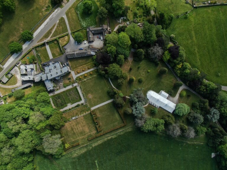 Aerial of the hall, gardens and pavilion, Tissington Hall